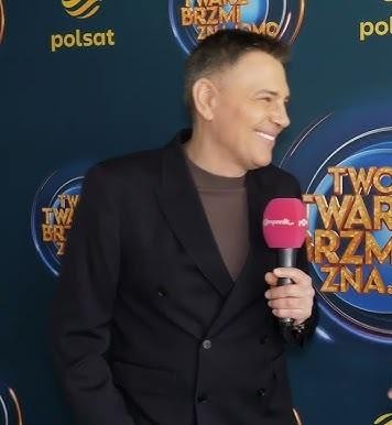 Krzysztof Ibisz z książką 